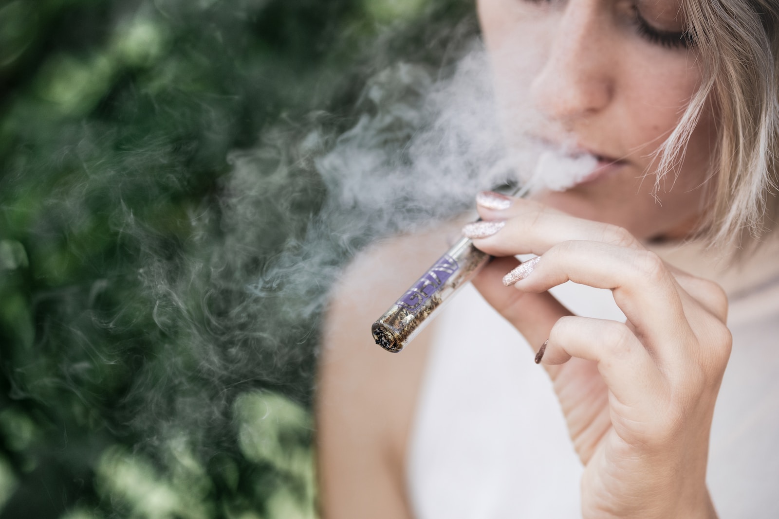 woman smoking vape